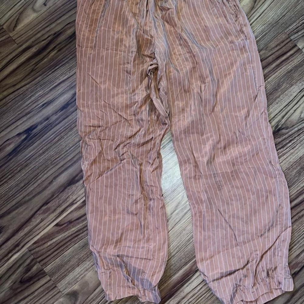 Soft Focus brown with thin white vertical stripes pants in a size S